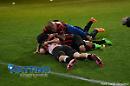 I gol-ammucchiata di Iemmello e il trionfo rossonero nella fotocronaca di Luigi Genzano